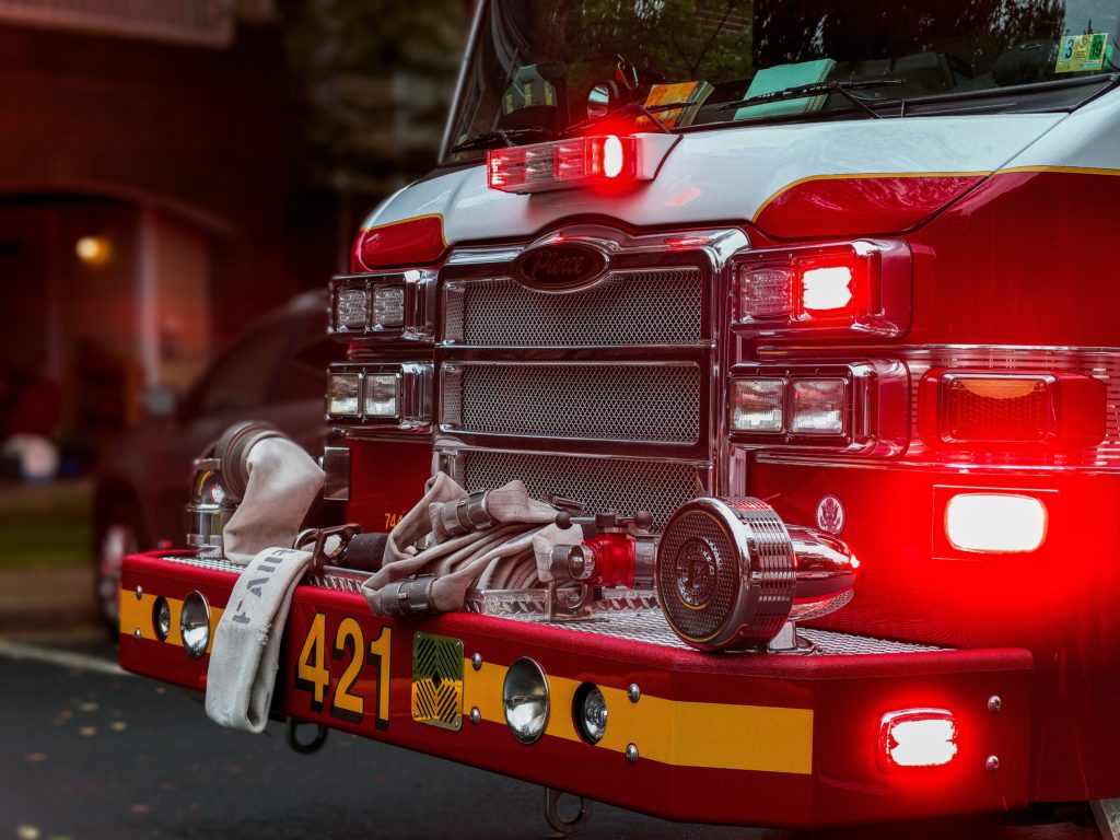 Front view of fire extinguisher truck with lights