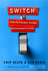 A red switch is on the wall.